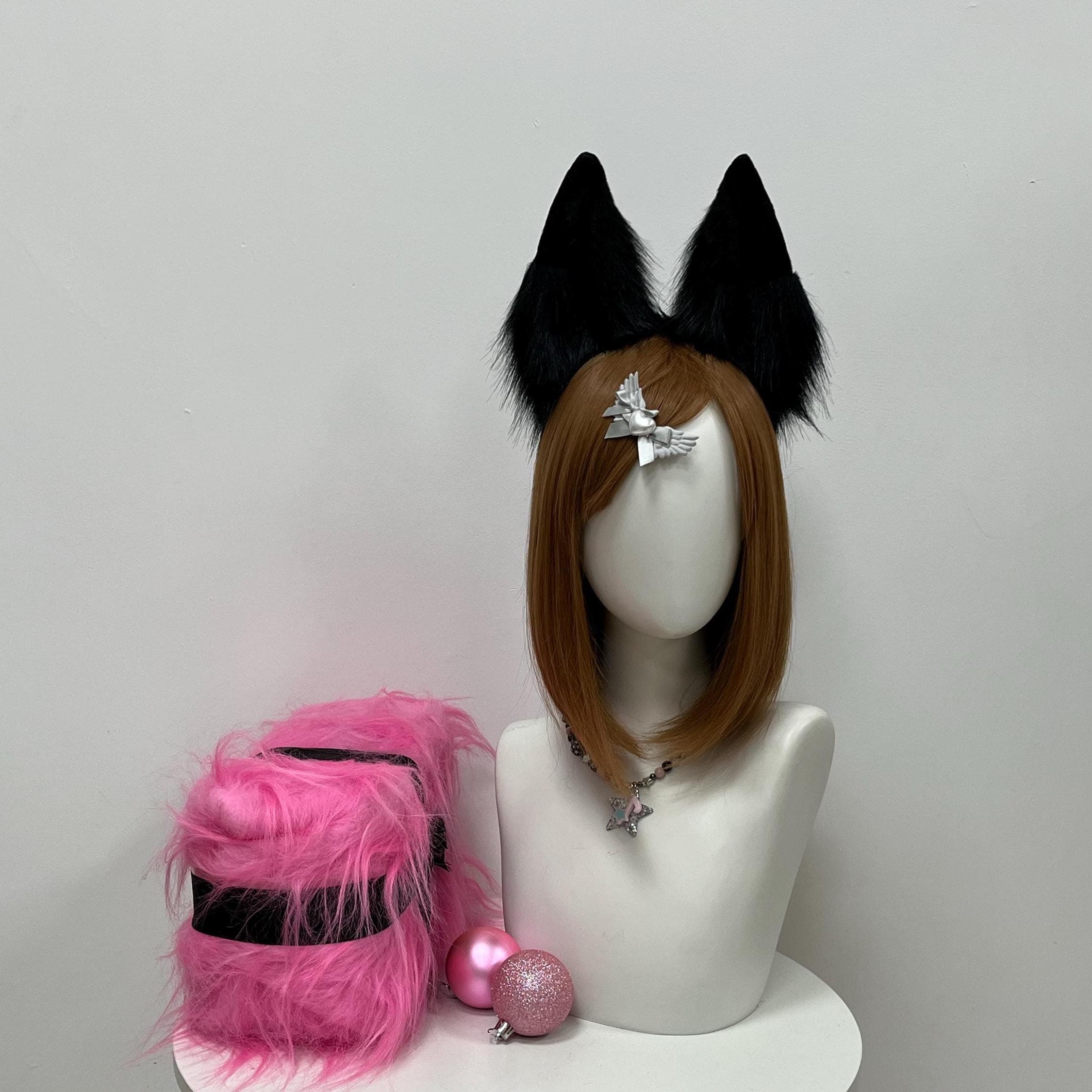 Pure jet black faux fur wolf ears headband shown front view, featuring tall pointed realistic ear shape with deep raven pile from tip to base. Dreamy pick for cosplayers building a midnight demon, midnight familiar, vampire hybrid, goth streamer character, or dark kitsune spirit. The inky black tone photographs with stunning depth under studio lights and pairs beautifully with blonde, platinum, bleached, red, and natural hair colors for easy versatile styling across endless outfit themes.