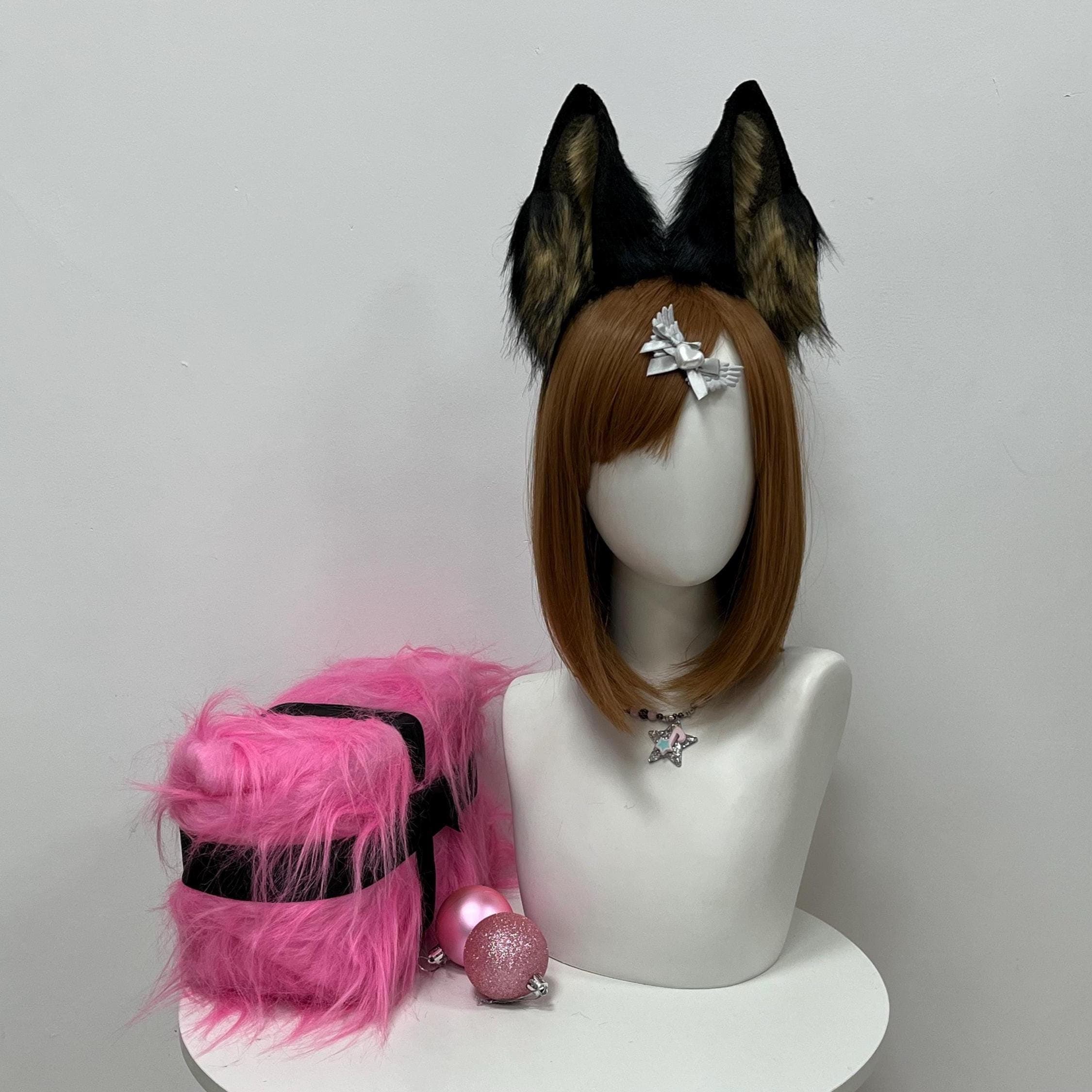 Detailed front capture of the black and brown tabby wolf ears showing fine fur strand detail, the mottled brindle pattern along the inner ear panels, and the crisp pointed ear tip shape. Great for cosplay photographers capturing a wild animal hybrid character, frontier wolf warrior, tribal fantasy build, mountain werewolf, or prehistoric shaman at pop culture cons. Handmade craftsmanship shows from every angle with dense brushable pile throughout and strong realistic pointed silhouette.