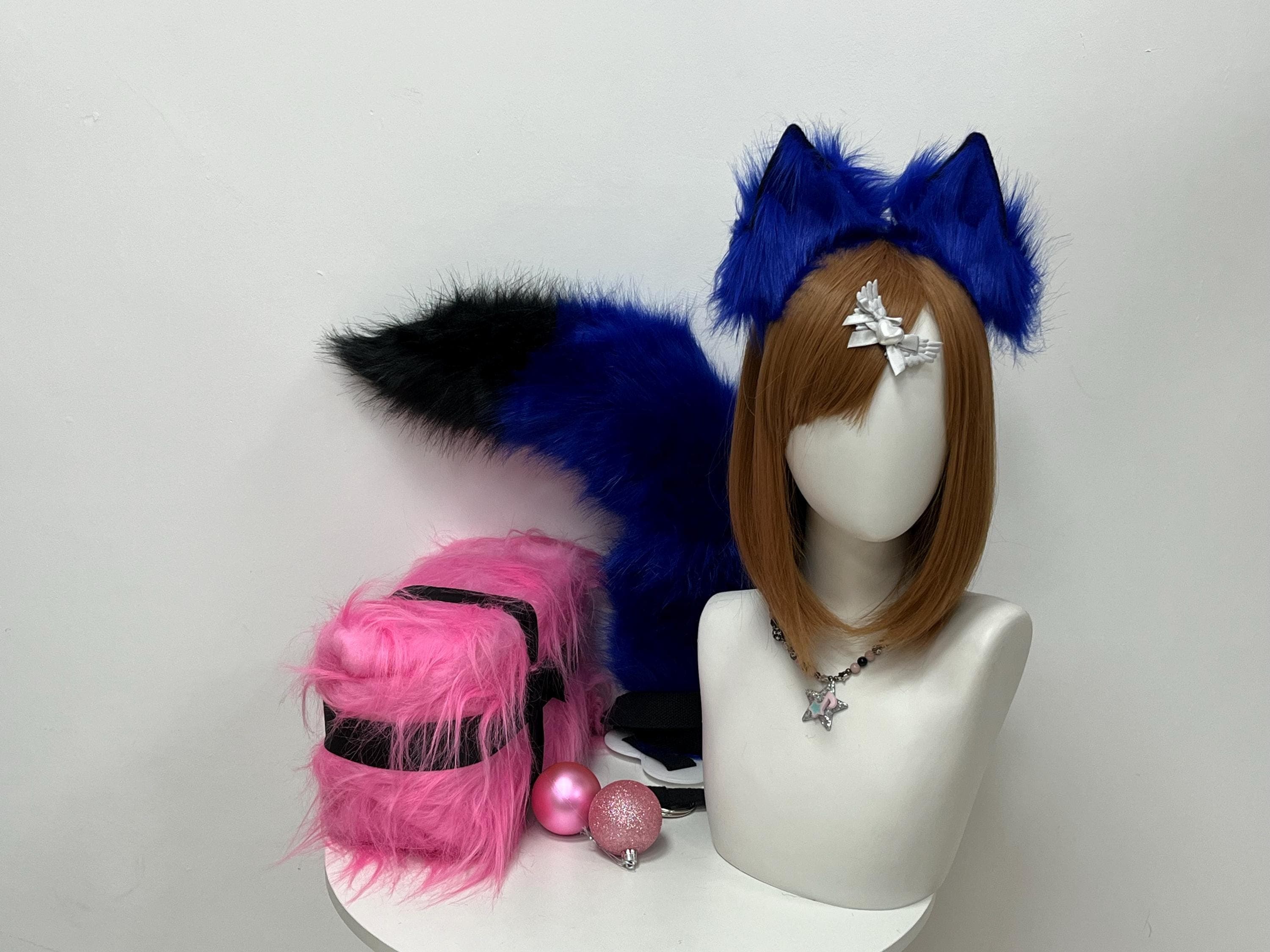 Three quarter angle of the sapphire blue fox ears and tail set capturing dimensional fur depth, the way light hits the raised blue pile from the side, and the natural curve of the long tail extending along the edge of the stand. Perfect gear for dark fairy LARP, midnight forest spirit cosplay, goth kawaii streamer looks, cyberpunk hybrid characters, stage drag performances, and thoughtful cosplay gifts for blue loving friends who collect animal ear and tail sets year round.