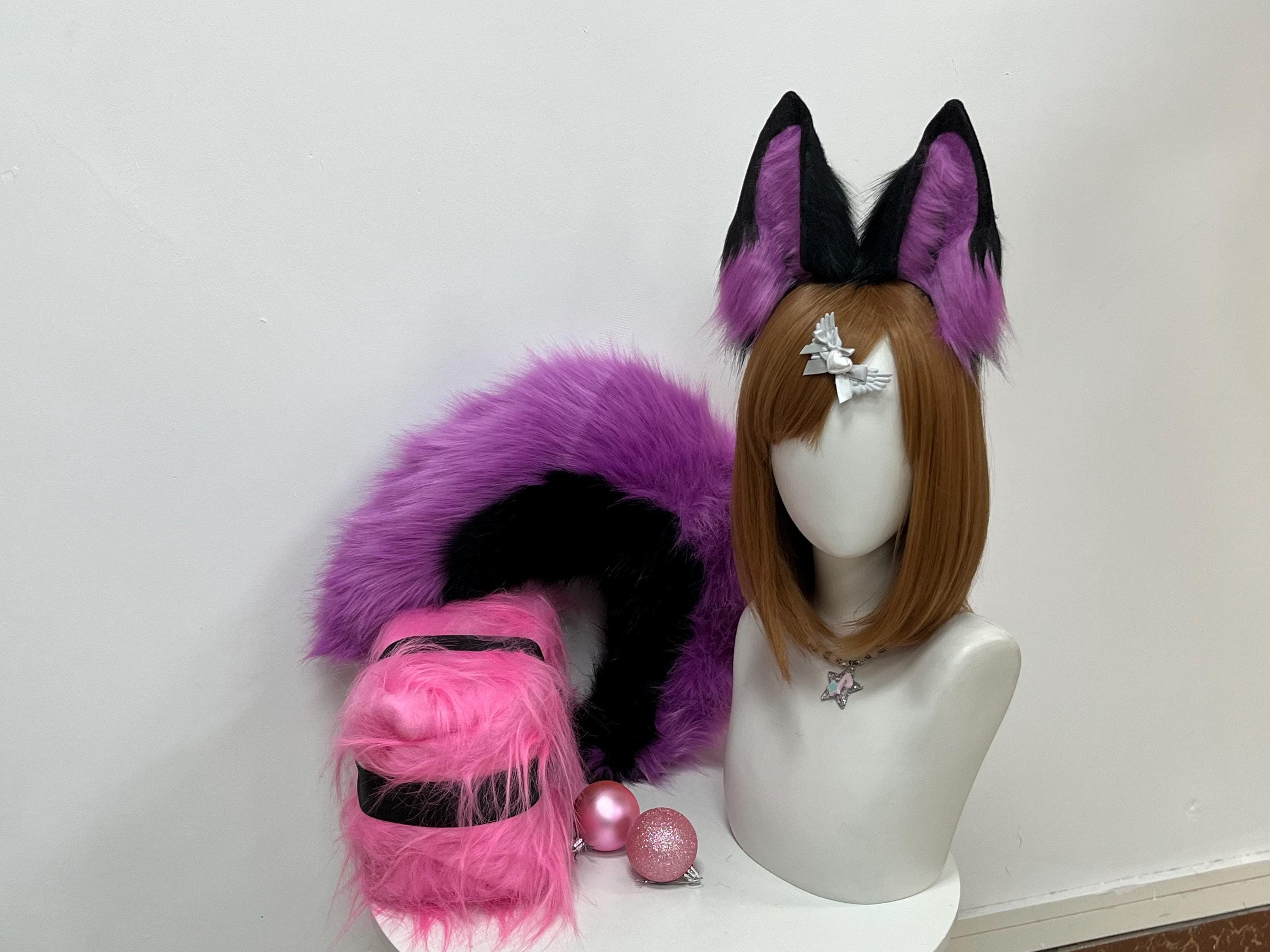 Black and purple wolf ears headband angled view, striking two tone faux fur cosplay wolf ears blending raven black tips with glowing magenta inner fur, handmade for therian fashion, anime kemonomimi cosplay, furry fandom cons, Halloween parties and fantasy festival wear. These timberwolf inspired ears feel soft and featherlight, ideal for wild fursona builds or dark fantasy wolf characters. Slip on the headband and howl at the moon in full costume mode at your next con.