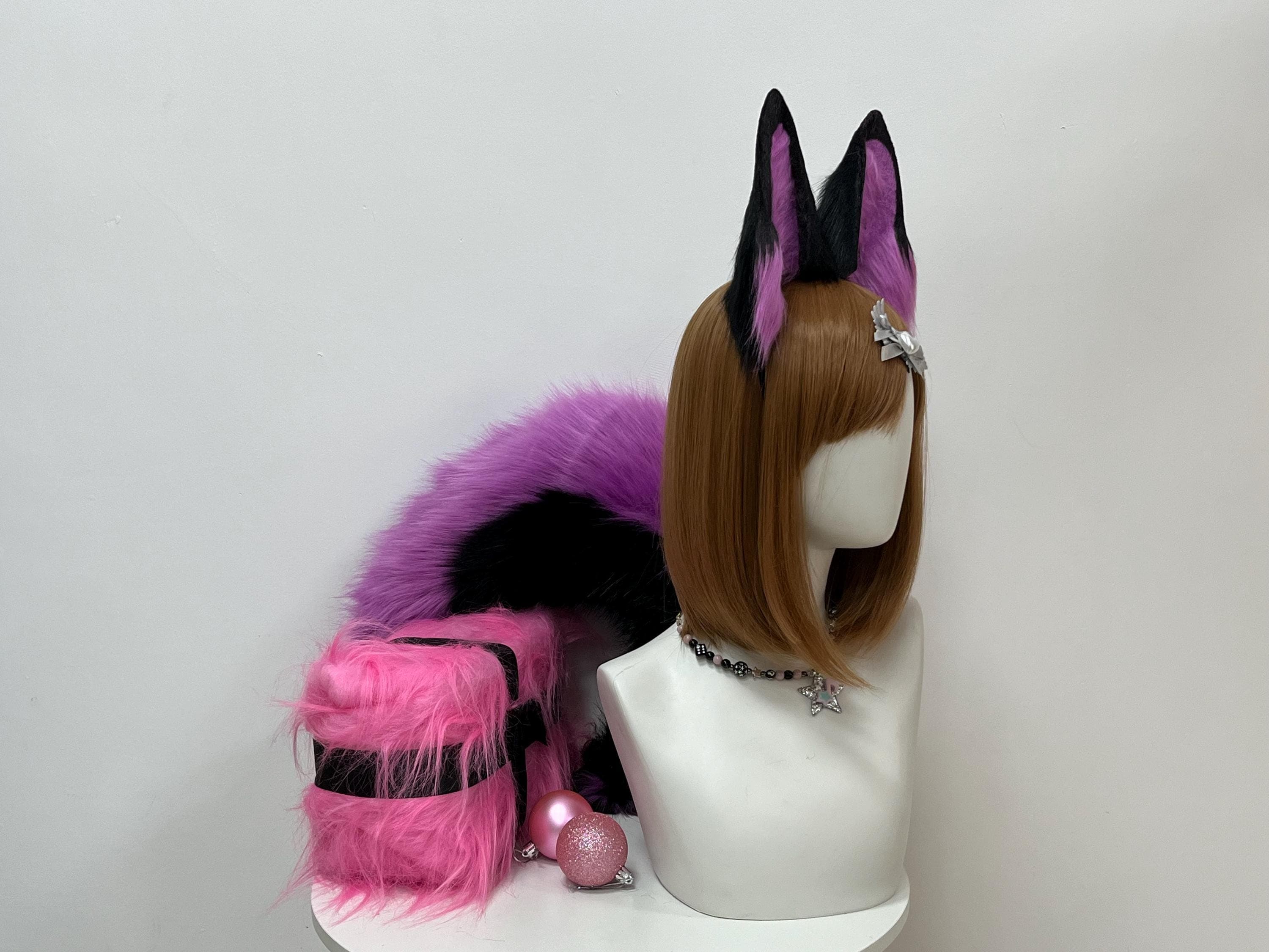 Purple and black wolf ears headband side profile, showing the tall pointed silhouette and layered two tone faux fur of this handmade cosplay accessory. Perfect for therian lupine looks, furry fursona builds, anime kemonomimi cosplay, Halloween costume nights, LARP characters and fantasy festival wear. The amethyst inner fur pops against raven black outer tips, giving these pointed canine ears a mystic galaxy vibe that stands out loud in any con crowd.