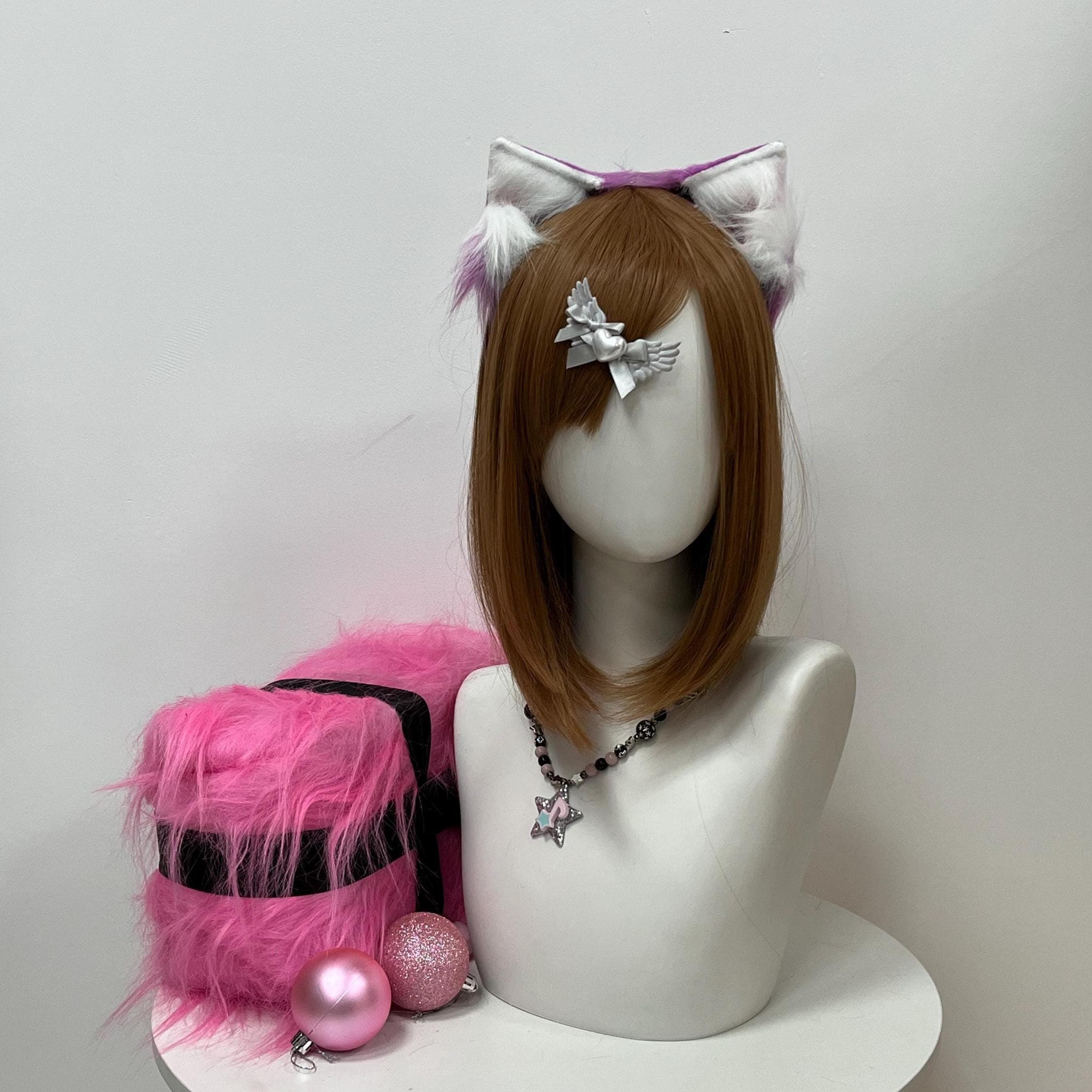 Realistic purple and white wolf ears headband shown front-and-center on a styled display head, hero shot capturing the bright lavender outer fur blending softly into snowy inner tufts. Handmade faux fur pieces follow the natural curve of a timberwolf ear, mounted on a comfy headband built for marathon con wear days. Ideal pickup for therian wolf kins, kemonomimi cosplay builds, furry fandom meetups, Renaissance LARP characters or OC makers chasing a feral fantasy wolf vibe.
