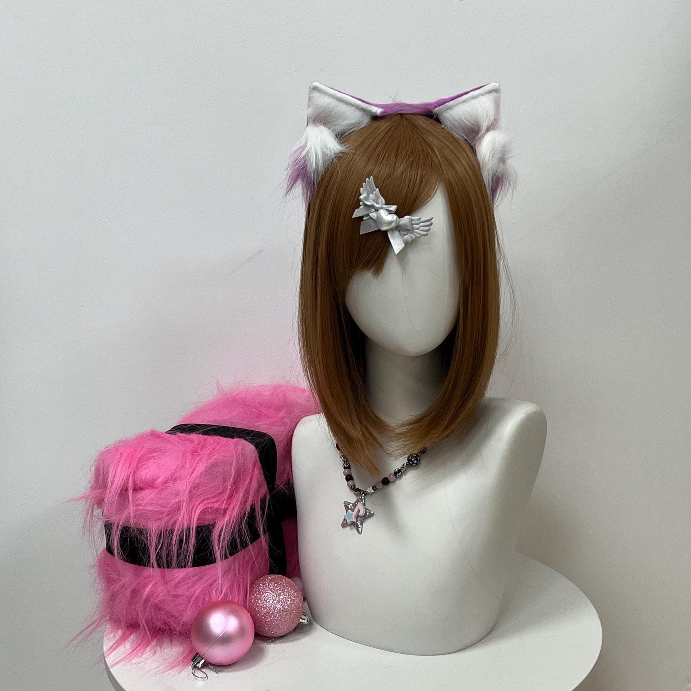 Straight-on angled view of the custom purple wolf ears, both peaks standing tall with vivid violet back fur and bright white front tufts framing the face. Lightweight headband construction tucks under the hairline so the ears read like real wolf ears growing right out of your scalp. Furry fandom staple for wolf therian drops, anime con debuts, Renaissance faire ranger characters, moonlit forest spirits or kemonomimi wolfgirl cosplay fits needing real bite.