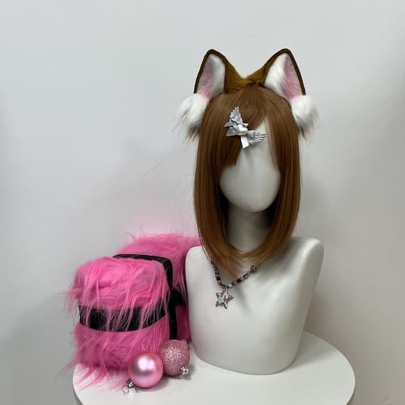High-quality handmade animal ear and tail costume set, designed for cosplay, masquerades, and Halloween events. Crafted from soft faux fur with realistic texture and 3D shape. Ideal for cat, fox, or rabbit characters from anime or games. Eco-friendly, hypoallergenic, and comfortable to wear. Adjustable headband and detachable tail make it versatile for all body types. Perfect for cosplay fans, photographers, and partygoers who want a cute, lifelike handmade accessory.