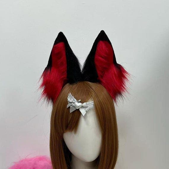 Handmade orange and black wolf ears headband made with realistic faux fur, perfect for cosplay costumes, furry conventions, Halloween outfits, and animal-themed events. Custom cosplay wolf ears for adults and teens, designed for comfort and style. This cosplay accessory features a durable headband and fluffy faux fur construction. Ideal for Halloween cosplay or furry fashion fans looking for unique wolf-themed accessories.