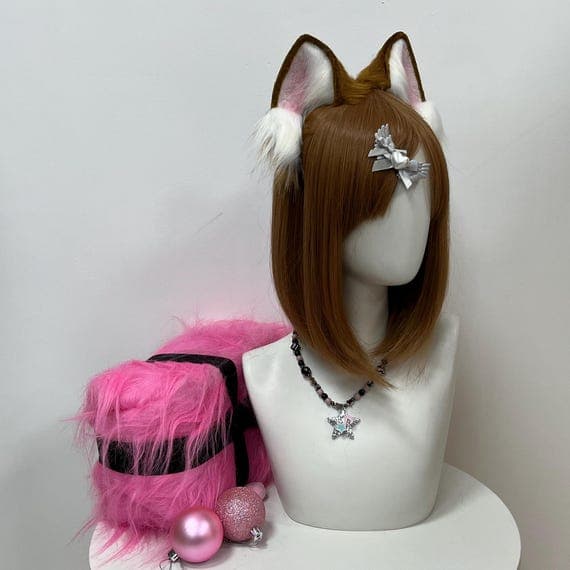 Handcrafted cosplay ears and tail set made from premium faux fur. Perfect for masquerades, comic cons, and themed parties. Soft, fluffy, and lightweight design makes it easy to wear for long hours. Great for anime, fantasy, and animal character costumes like cat, fox, bunny, or wolf. Eco-friendly materials ensure safety for sensitive skin. Adjustable headband and tail strap provide flexibility and comfort. The ideal handmade gift for cosplay fans and costume enthusiasts.