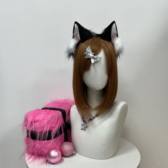 Handcrafted cosplay ears and tail set made from premium faux fur. Perfect for masquerades, comic cons, and themed parties. Soft, fluffy, and lightweight design makes it easy to wear for long hours. Great for anime, fantasy, and animal character costumes like cat, fox, bunny, or wolf. Eco-friendly materials ensure safety for sensitive skin. Adjustable headband and tail strap provide flexibility and comfort. The ideal handmade gift for cosplay fans and costume enthusiasts.