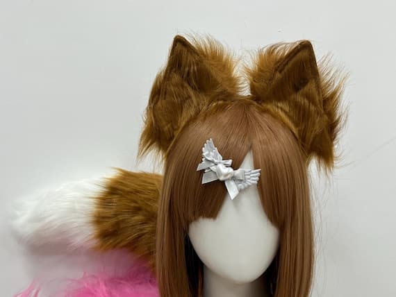 Realistic fox ears and tail set with matching paws, designed for cosplay enthusiasts and furry fans. Soft faux fur creates a lifelike appearance, perfect for Halloween costumes, roleplay, and anime events. The adjustable headband allows for a secure and comfortable fit, while the bendable tail provides extra realism. Choose from various colors, including brown, black, and gray. A must-have accessory for conventions, petplay, and animal-themed dress-up.