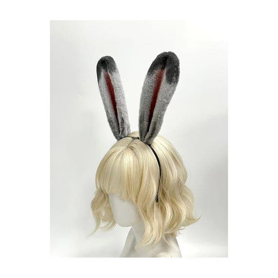 Back view grey bunny rabbit ears headband showing how slim design sits comfortably on head with long upright poseable ears perfect for cosplay costume Halloween Easter. Grey plush faux fur with rose pink inner detail realistic rabbit proportions bendable wire frame holds custom positions for anime convention photoshoots. Lightweight comfortable design disappears under wigs or blends with natural hair ideal for bunny girl cosplay rave festival Easter party Halloween costume anime con outfit strea