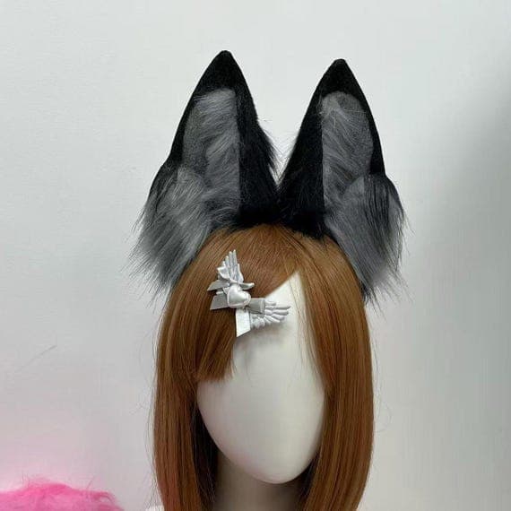 Realistic faux fur wolf ears in orange and black, attached to a comfortable handmade headband for cosplay costumes and Halloween events. These custom wolf ears are perfect for furry community members, therian cosplay, and animal-themed parties. Featuring soft faux fur, these orange black wolf ears are lightweight, durable, and designed for long wear. A unique accessory for cosplay lovers and handmade costume enthusiasts.