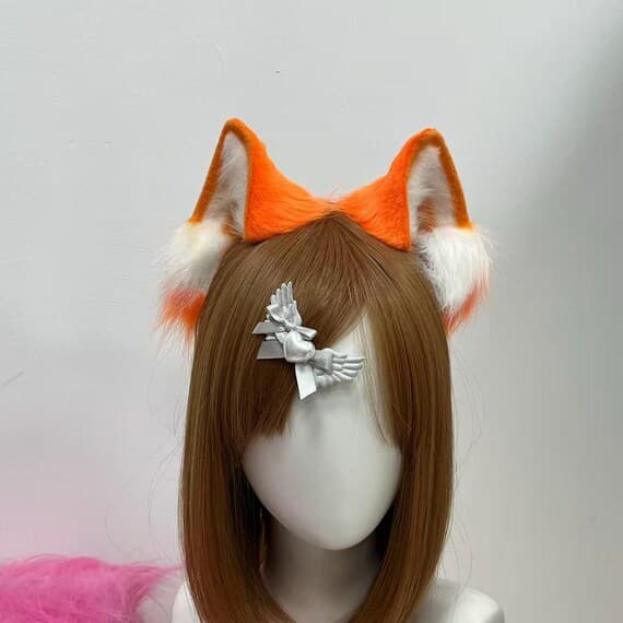 Embrace your inner cat with this full cosplay set including cat ears, paw gloves, mask, and tail. Designed from soft, high-quality faux fur, this set features a mix of brown and white fur that mimics the appearance of a real cat. Perfect for anime cosplay, furry fans, and Halloween. The adjustable headband ensures a comfortable fit, while the paws and tail complete the look.