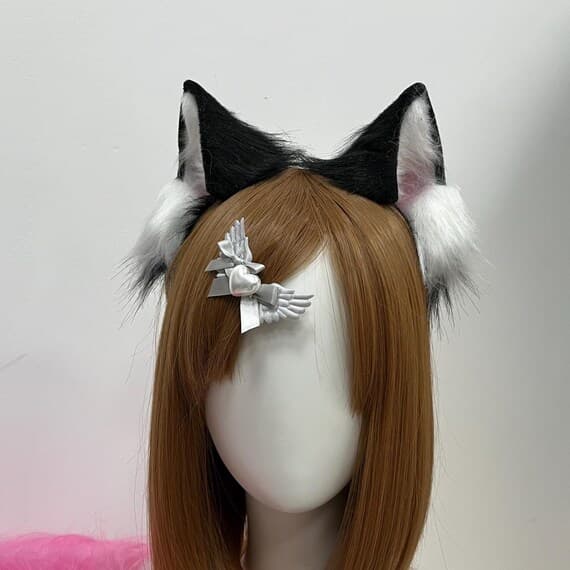 Realistic handmade animal ears and tail set crafted from high-quality faux fox or rabbit fur. Designed for cosplay, masquerade, anime conventions, and photo sessions. Soft, fluffy texture mimics real fur without harm to animals. Fully adjustable headband and flexible tail with wire core for shaping. Perfect for creating cute or elegant character looks — fox, cat, wolf, or bunny. Durable, eco-friendly, and ideal for Halloween or fantasy costume accessories.