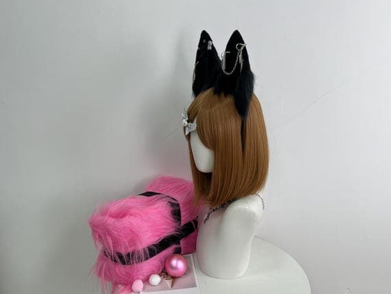 "Collection of handmade fox and wolf cosplay ears in different colors, including shades of grey, orange, white, and black. Each pair is crafted with high-quality faux fur for a realistic and natural look. The headbands are sturdy, comfortable, and perfect for anyone looking to complete their cosplay look."
