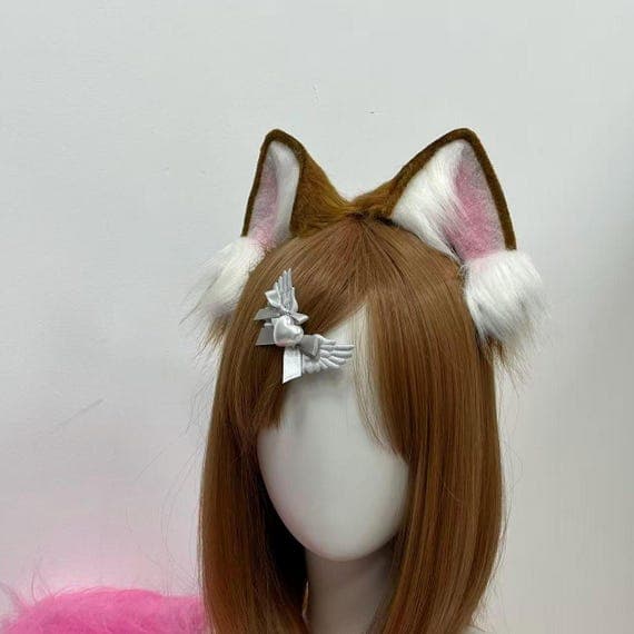 Realistic handmade animal ears and tail set crafted from high-quality faux fox or rabbit fur. Designed for cosplay, masquerade, anime conventions, and photo sessions. Soft, fluffy texture mimics real fur without harm to animals. Fully adjustable headband and flexible tail with wire core for shaping. Perfect for creating cute or elegant character looks — fox, cat, wolf, or bunny. Durable, eco-friendly, and ideal for Halloween or fantasy costume accessories.