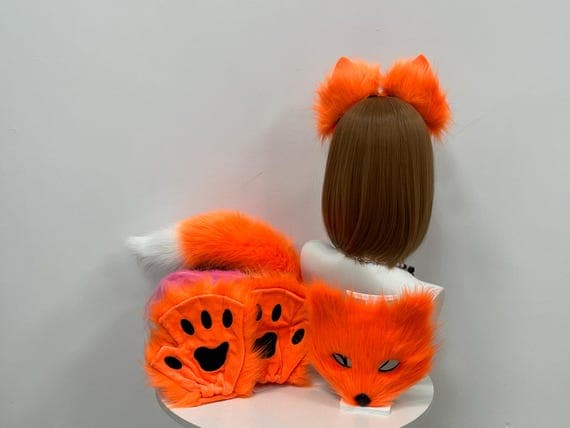 Fluffy furry paws gloves in pink and black for cosplay or furry costumes. These adorable, handmade gloves are perfect for petplay, Halloween, or any animal-themed event. Featuring faux fur, claws, and fingerless design for comfort, they are ideal for fox, wolf, or cat fans. Soft, breathable, and stylish, these gloves make a perfect gift for therian and cosplay enthusiasts