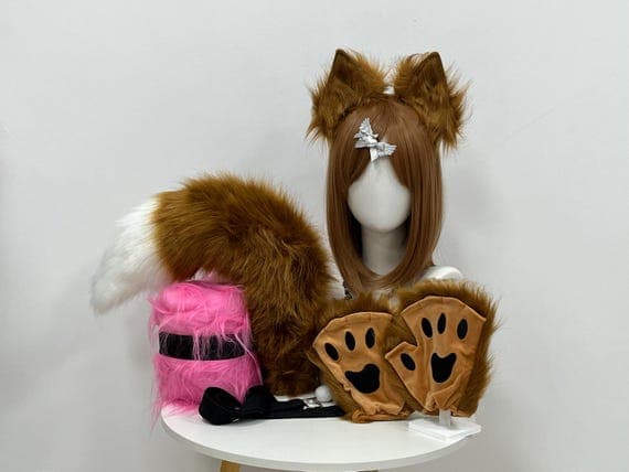 Handmade fox ears, paws, and tail set with soft faux fur. Custom cosplay accessories for cosplay, Halloween, and roleplay. Realistic fox costume design with adjustable headband and bendable tail. Available in brown, red, and gray colors. Perfect for conventions, furry fans, and anime cosplay enthusiasts. High-quality, lifelike animal accessories to complete your cosplay look. Comfortable fit for long-term wear during events.