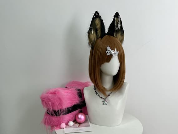 Cyberpunk-inspired animal ears headband in sleek black and gray faux fur for a futuristic look. Designed for cosplay, parties, or as a fun addition to your Halloween costume, these large, fluffy ears provide a realistic and edgy touch to your outfit. The adjustable headband ensures a secure fit, while the faux fur adds a soft and comfortable feel. Perfect for cosplay enthusiasts, furry fans, and anyone looking to add an animal twist to their cyberpunk or themed costume